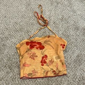 Super cute top! Inside there is a cover for your boobs. The rest is sheer.